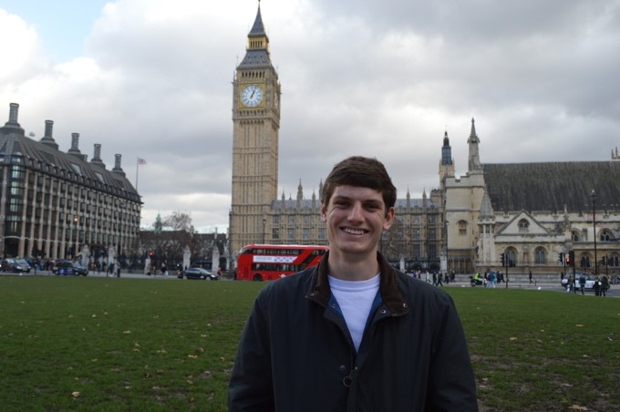 Auburn student abroad in London smiles for the camera with Big Ben clock tower looming in the background